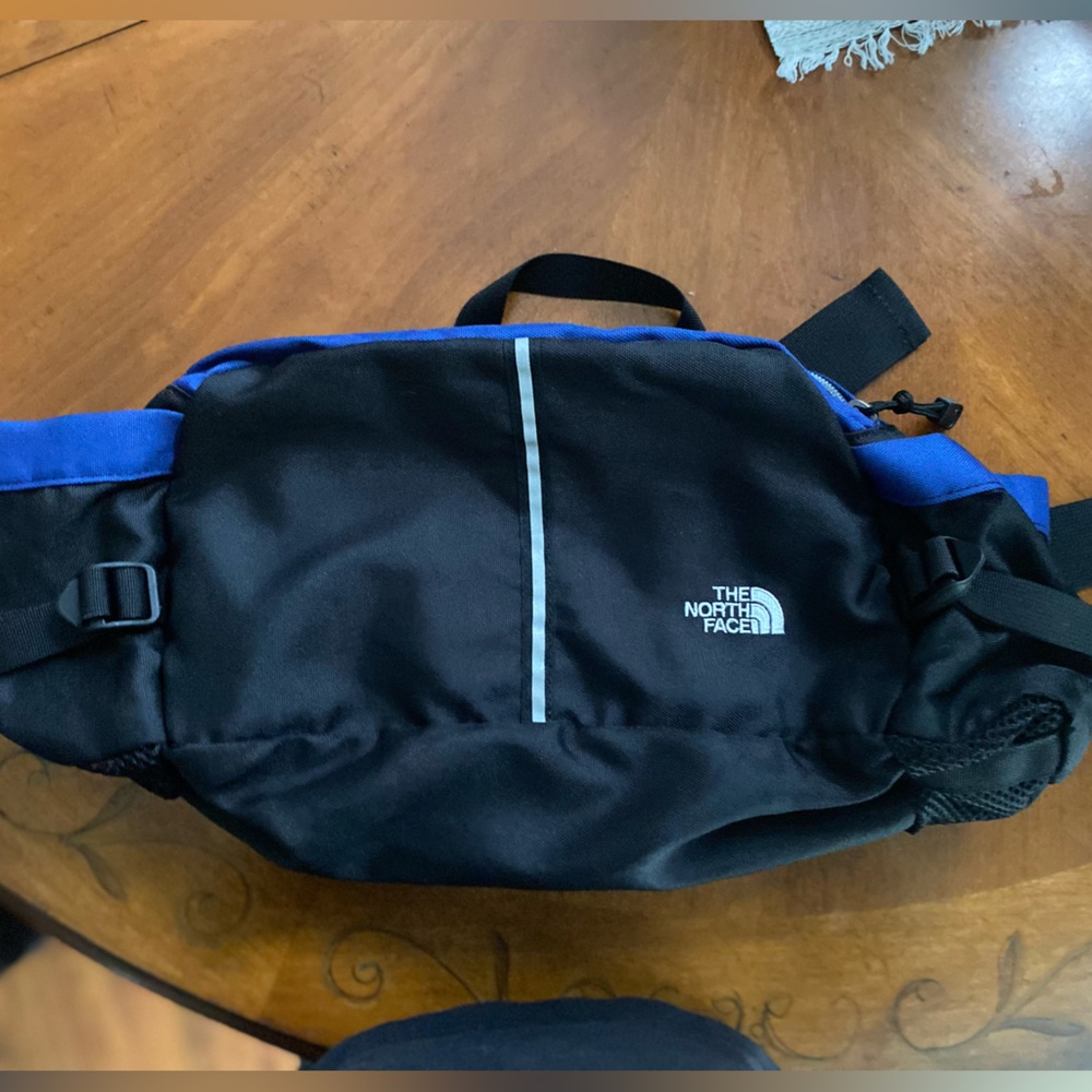 The North Face black hiking pack belt